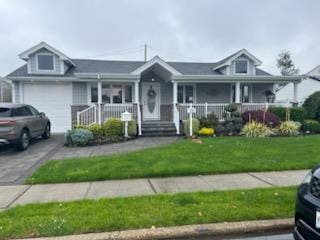 738 Craft Ave, Franklin Square, NY 11010 - view of front of property featuring a porch, a front lawn, and asphalt driveway