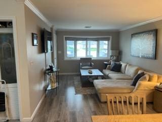 738 Craft Ave, Franklin Square, NY 11010 - living area featuring wood finished floors, ornamental molding, and baseboards
