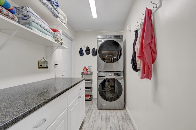 738 Craft Ave, Franklin Square, NY 11010 - laundry area featuring stacked washer / dryer and light wood-style floors