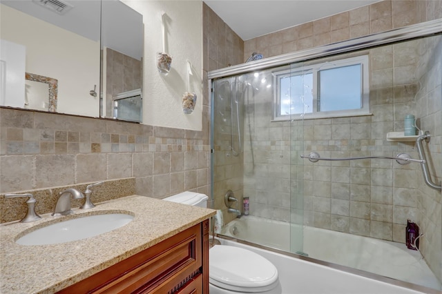 738 Craft Ave, Franklin Square, NY 11010 - full bath with tile walls, vanity, and enclosed tub / shower combo
