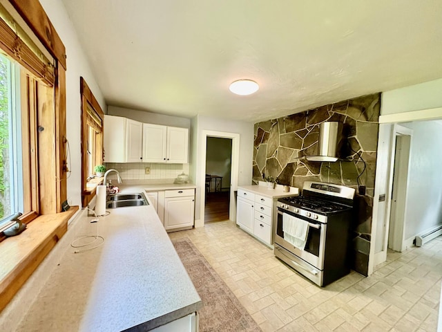 13 Rockland Rd, Roscoe, NY 12776 - kitchen featuring stainless steel range with gas cooktop, healthy amount of natural light, tasteful backsplash, and light countertops