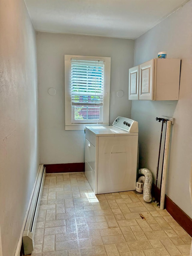 13 Rockland Rd, Roscoe, NY 12776 - laundry area with washer / dryer, a baseboard heating unit, cabinet space, and brick patterned flooring