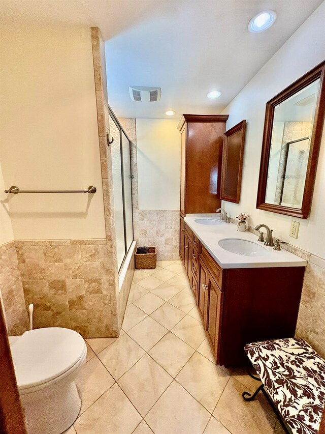 13 Rockland Rd, Roscoe, NY 12776 - full bath featuring tile walls, tiled shower, a wainscoted wall, tile patterned flooring, and double vanity