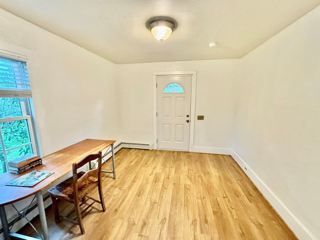 13 Rockland Rd, Roscoe, NY 12776 - foyer featuring light wood-style flooring and a baseboard heating unit