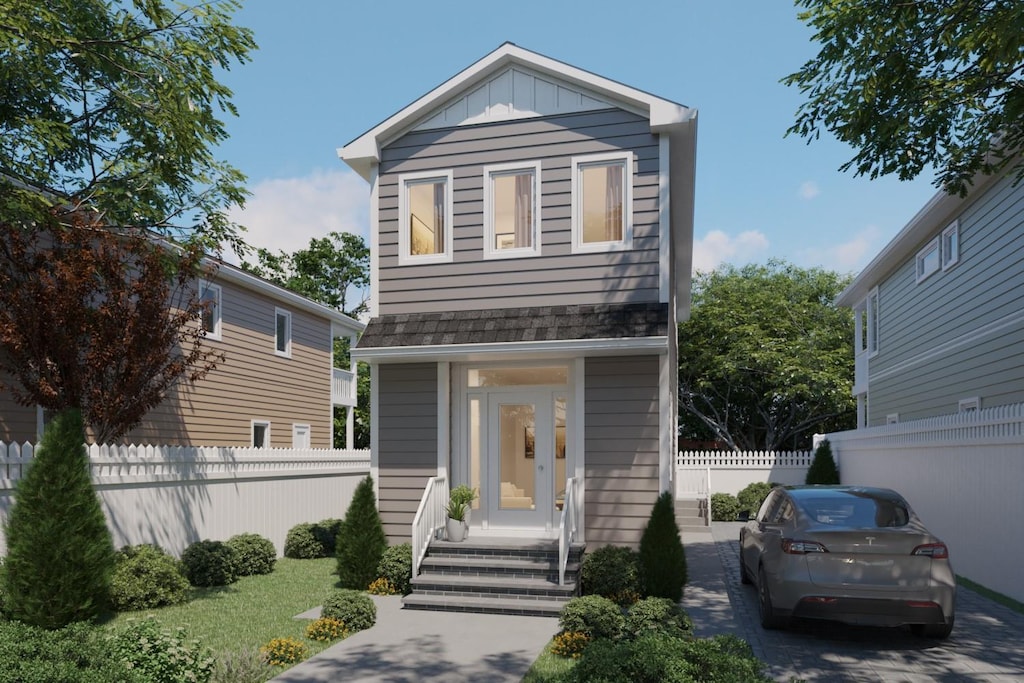 119 Whittier Dr, Kings Park, NY 11754 - view of front of property featuring board and batten siding and a shingled roof