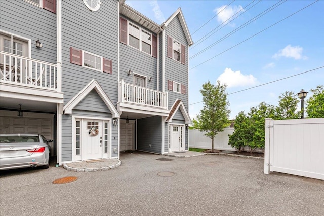 24 Hearthstone Ct Unit 24, Farmingdale, NY 11735 - view of front of property featuring a balcony and an attached garage