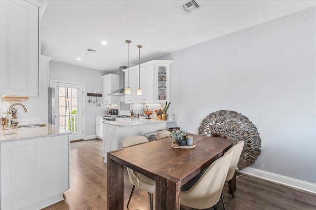 24 Hearthstone Ct Unit 24, Farmingdale, NY 11735 - dining room with wood finished floors and recessed lighting