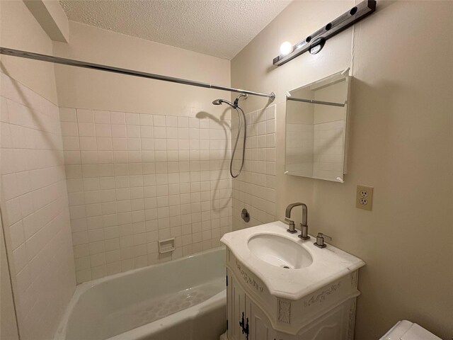 152-18 Union Tpke Unit 9P, Flushing, NY 11367 - full bathroom featuring a textured ceiling, vanity,  shower combination, and toilet