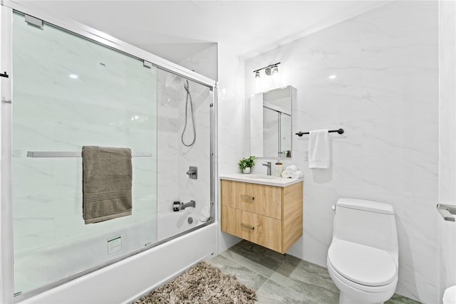 131-19 Fowler Ave Unit 2B, Flushing, NY 11355 - full bath with combined bath / shower with glass door, vanity, and toilet