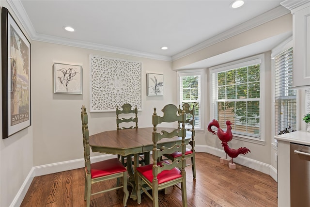 81 Hidden Ridge Dr, Syosset, NY 11791 - dining area with wood finished floors, crown molding, and recessed lighting