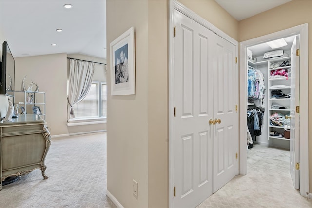 81 Hidden Ridge Dr, Syosset, NY 11791 - hallway with light carpet and recessed lighting