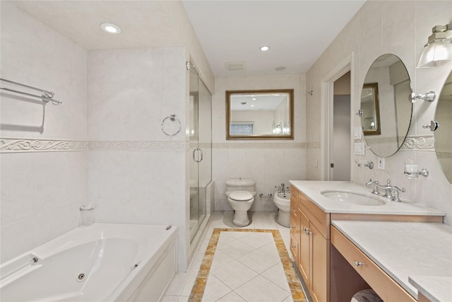 81 Hidden Ridge Dr, Syosset, NY 11791 - bathroom with tile walls, a shower stall, vanity, a bidet, and tile patterned floors