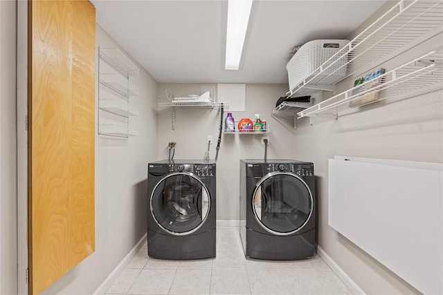 81 Hidden Ridge Dr, Syosset, NY 11791 - washroom featuring washer and clothes dryer and tile patterned floors