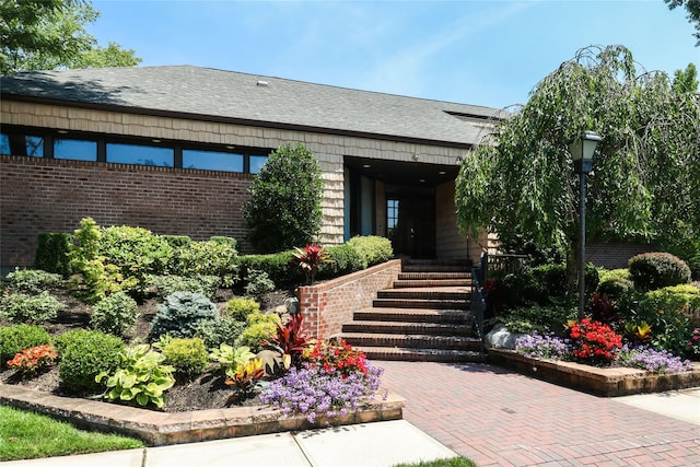 81 Hidden Ridge Dr, Syosset, NY 11791 - entrance to property featuring brick siding