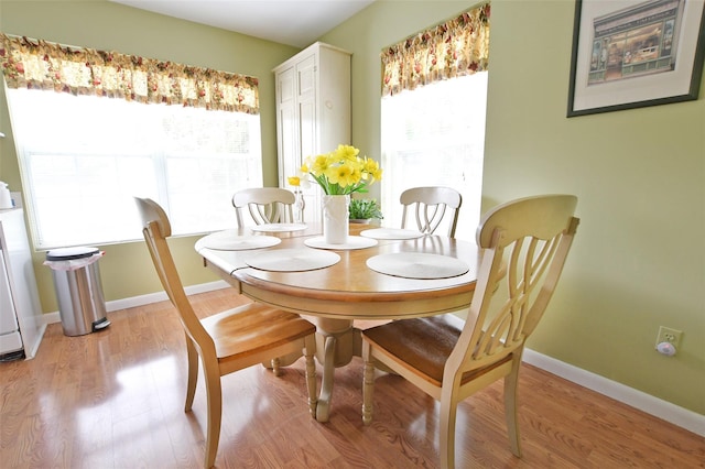 9 Quail Path, Coram, NY 11727 - dining space with healthy amount of natural light, light wood-style floors, and baseboards