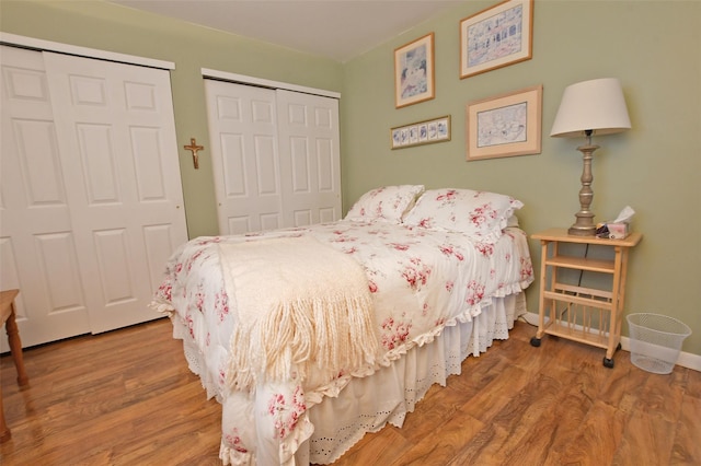 9 Quail Path, Coram, NY 11727 - bedroom with wood finished floors, baseboards, and a closet