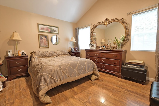 9 Quail Path, Coram, NY 11727 - bedroom featuring wood finished floors and lofted ceiling