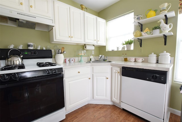 9 Quail Path, Coram, NY 11727 - kitchen with range with gas cooktop, white dishwasher, a sink, range hood, and white cabinets