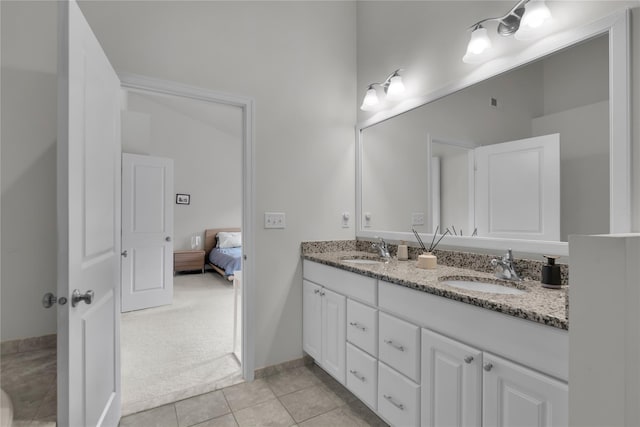 20 Dennis Ln, Pleasantville, NY 10570 - bathroom with double vanity, tile patterned floors, and ensuite bathroom