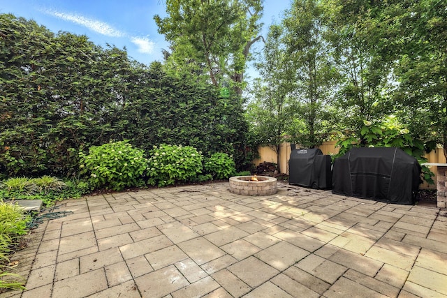 305 Columbus Ave, Harrison, NY 10604 - view of patio with a fire pit and a grill