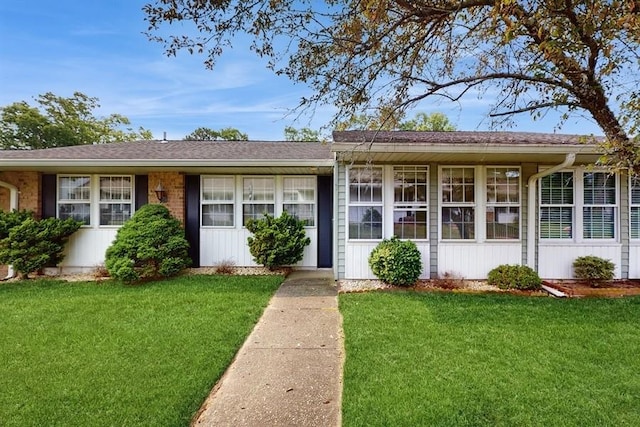 377C Woodbridge Dr, Ridge, NY 11961 - ranch-style home with a front yard