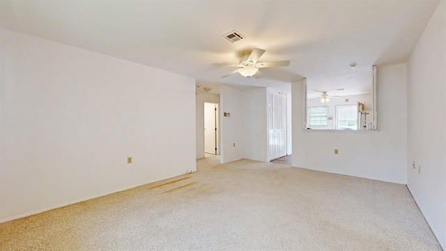 377C Woodbridge Dr, Ridge, NY 11961 - spare room featuring ceiling fan and light carpet