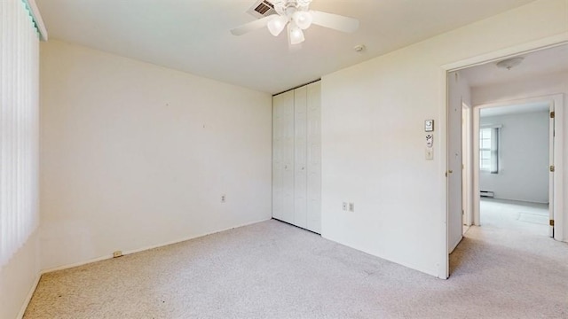 377C Woodbridge Dr, Ridge, NY 11961 - unfurnished bedroom featuring a closet, carpet, and ceiling fan