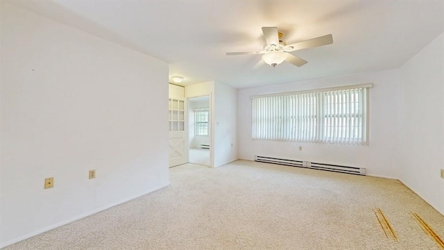 377C Woodbridge Dr, Ridge, NY 11961 - carpeted empty room with baseboard heating and a ceiling fan
