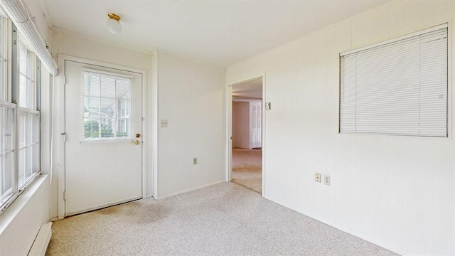377C Woodbridge Dr, Ridge, NY 11961 - carpeted empty room with baseboard heating
