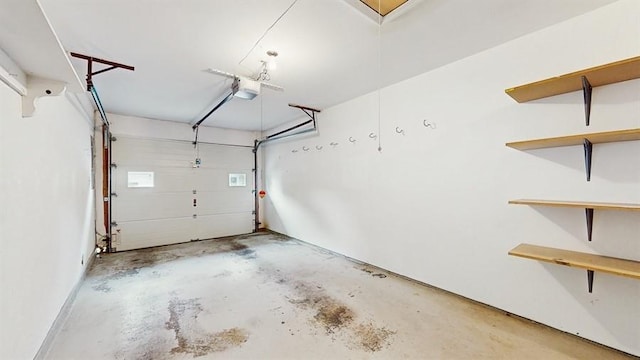 377C Woodbridge Dr, Ridge, NY 11961 - garage featuring a garage door opener