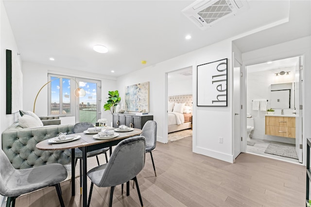 131-19 Fowler Ave Unit 7B, Flushing, NY 11355 - dining space with light wood-style floors, baseboards, and recessed lighting