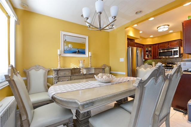 1319 E 86th St, Brooklyn, NY 11236 - dining room with a chandelier, recessed lighting, and light tile patterned floors