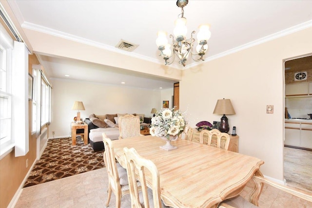 8519 212th St, Hollis Hills, NY 11427 - dining space with a chandelier and crown molding