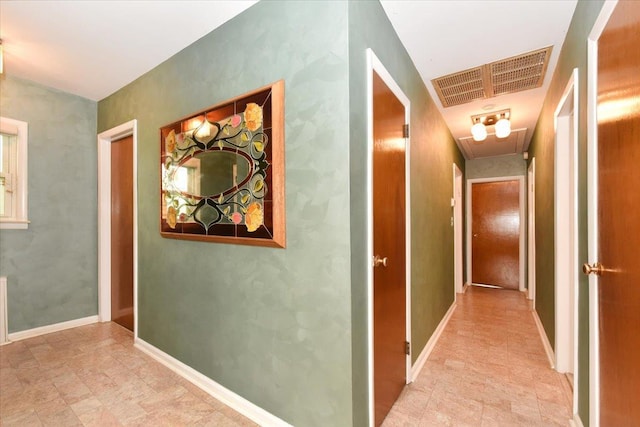 8519 212th St, Hollis Hills, NY 11427 - corridor with attic access and baseboards