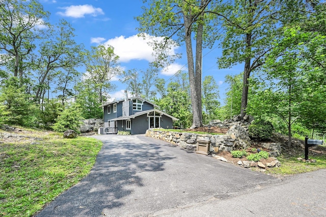 39 Cliff Rd, Greenwood Lake, NY 10925 - view of front of home featuring driveway and a chimney