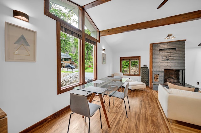 39 Cliff Rd, Greenwood Lake, NY 10925 - dining area featuring wood finished floors and a brick fireplace