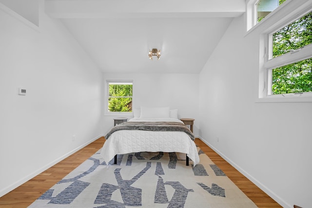 39 Cliff Rd, Greenwood Lake, NY 10925 - bedroom with wood finished floors and a chandelier