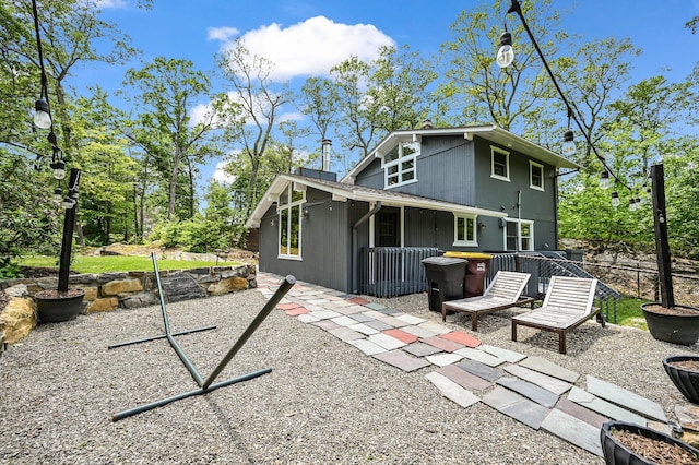 39 Cliff Rd, Greenwood Lake, NY 10925 - back of property with a patio area
