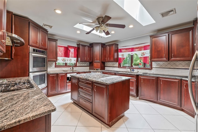 19 Farview Ter, Airmont, NY 10901 - kitchen with appliances with stainless steel finishes, dark brown cabinets, decorative backsplash, and recessed lighting
