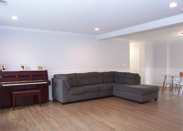 8 W Narcissus Rd, Mastic Beach, NY 11951 - living room featuring wood finished floors, wainscoting, crown molding, and recessed lighting