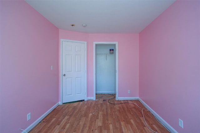 117 Bethune Blvd Unit 3, Spring Valley, NY 10977 - unfurnished bedroom featuring wood finished floors and a closet