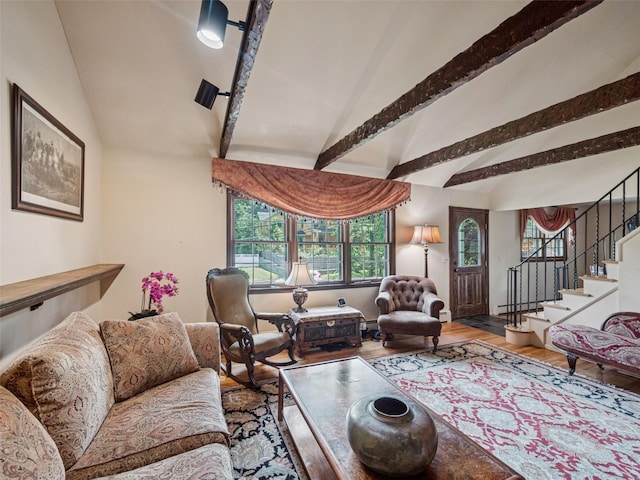 347 Scudder Ave, Northport, NY 11768 - living area with wood finished floors, plenty of natural light, stairs, high vaulted ceiling, and beamed ceiling