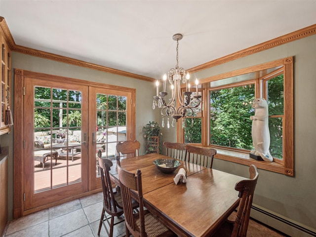 347 Scudder Ave, Northport, NY 11768 - dining room featuring a baseboard heating unit, french doors, a chandelier, and ornamental molding