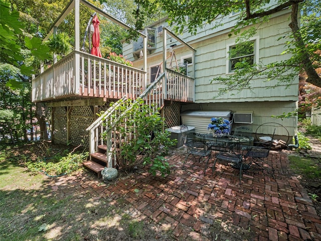 347 Scudder Ave, Northport, NY 11768 - rear view of property featuring a patio area, a wooden deck, a wall unit AC, stairway, and outdoor dining space
