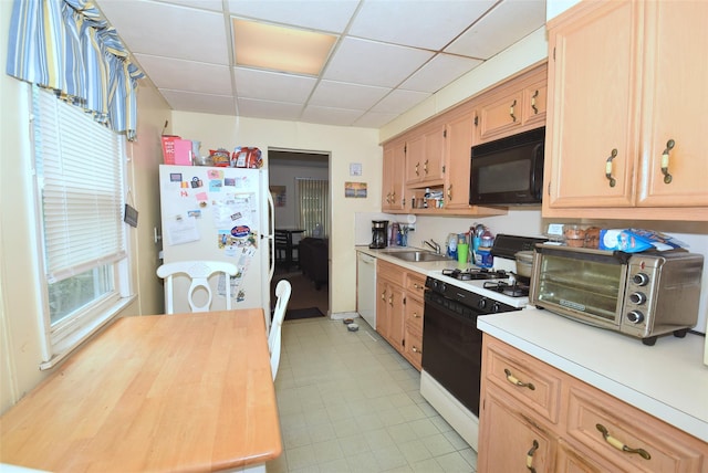 113 Edgeworth St, Valley Stream, NY 11581 - kitchen featuring white appliances, light brown cabinetry, a paneled ceiling, butcher block countertops, and light tile patterned floors