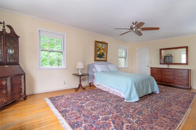 3 Little Ln, White Plains, NY 10605 - bedroom with wood finished floors, multiple windows, crown molding, and a ceiling fan