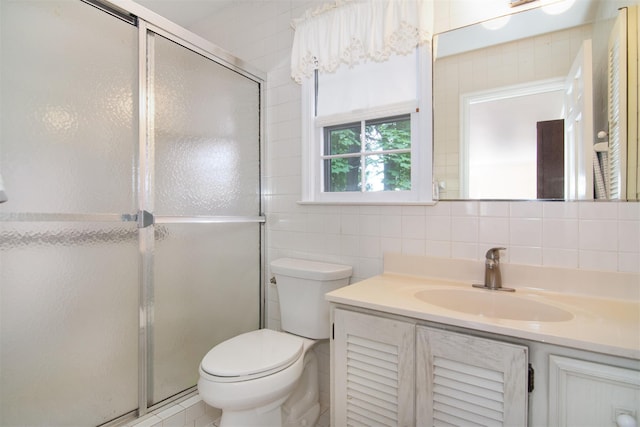 3 Little Ln, White Plains, NY 10605 - full bathroom featuring vanity, a stall shower, tile walls, and backsplash