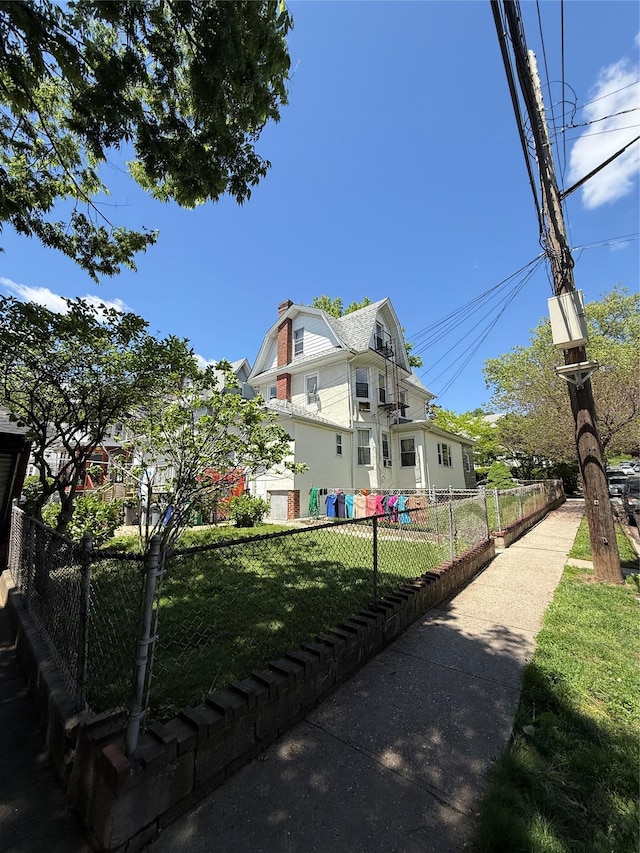 8520 85th Rd, Woodhaven, NY 11421 - view of home's exterior featuring a gambrel roof and a chimney
