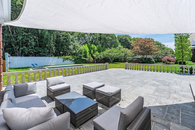 1750 Mount Beulah Ave, Southold, NY 11971 - fenced backyard featuring an outdoor hangout area, a swimming pool, and a patio area