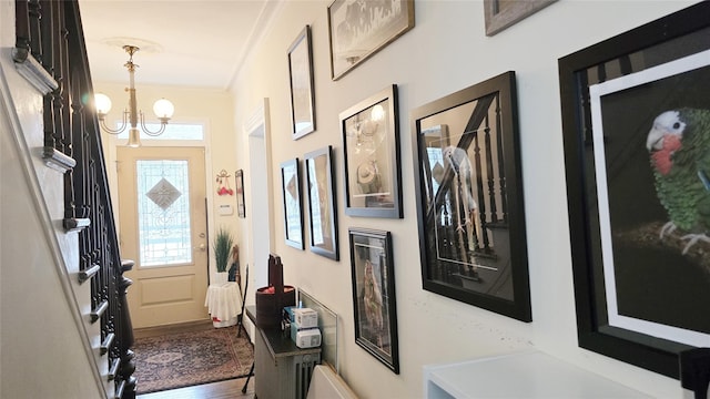 14436 32nd Ave, Flushing, NY 11354 - entrance foyer featuring plenty of natural light, crown molding, a chandelier, and wood finished floors